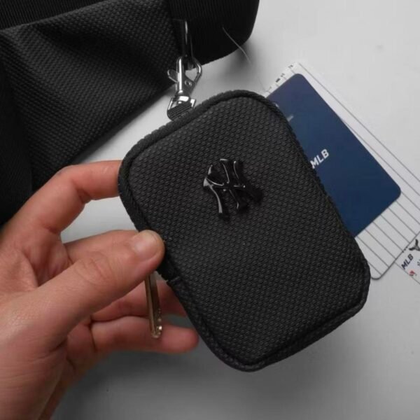 Stylish MLB bag featuring a sleek black design with a Metal New York Yankees logo. - Image 4